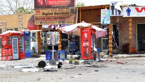 Debris is seen near shops damaged during a foiled suicide attack in Luxor