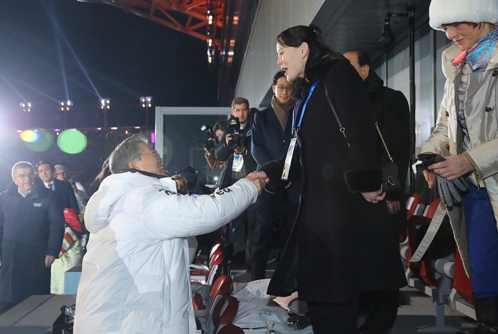 South Korean President Moon Jae-in shakes hands with Kim Jong Un's younger sister Kim Yo Jong at the Winter Olympics opening ceremony in Pyeongchang